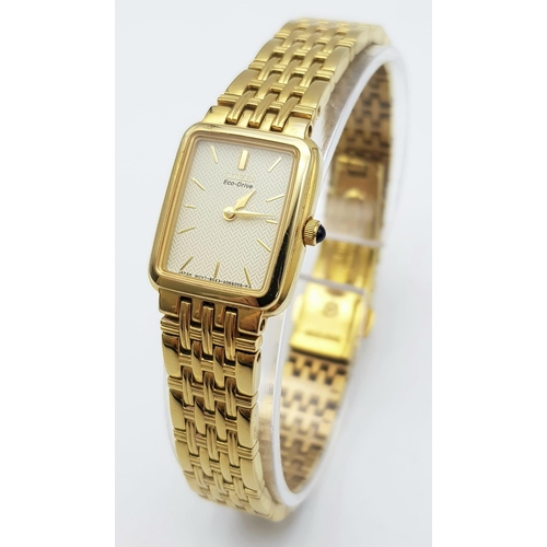 1316 - A Citizen Eco-Drive Gold Plated Ladies Watch. Gold plated bracelet and case - 18mm. White dial. In w... 