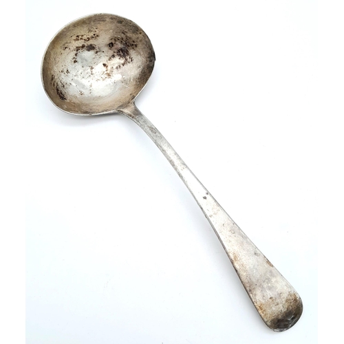 1168 - An antique Georgian sterling silver ladle with full London hallmarks, 1804. Total weight 43G. Total ... 