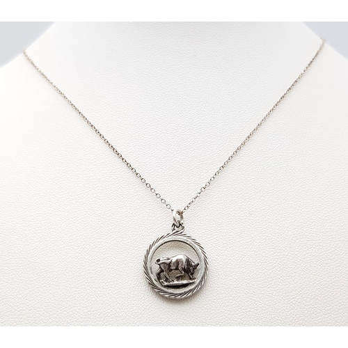 1194 - A vintage 925 silver bull pendant on silver belcher chain. Total weight 3.1G. Total length 42cm.