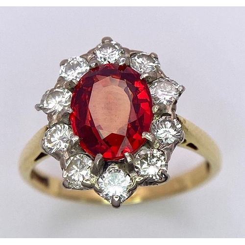 1230 - A TOP QUALITY 2.7ct NATURAL RUBY SURROUNDED BY A CLUSTER OF DIAMONDS AND SET IN 18K GOLD .   3.6gms ... 