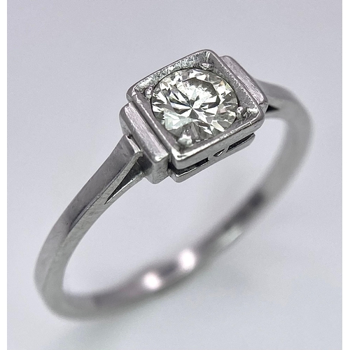 1244 - AN ANTIQUE ART DECO PLATINUM SOLITAIRE RING WITH JUST UNDER HALF A CARAT OF FINE CLEAN DIAMOND . 3.1... 