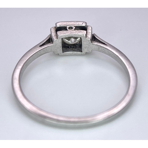 1244 - AN ANTIQUE ART DECO PLATINUM SOLITAIRE RING WITH JUST UNDER HALF A CARAT OF FINE CLEAN DIAMOND . 3.1... 