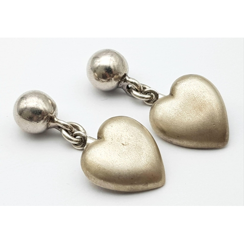 1285 - A vintage pair of sterling silver heart cufflinks. Come with full Edinburgh hallmarks. Total weight ... 