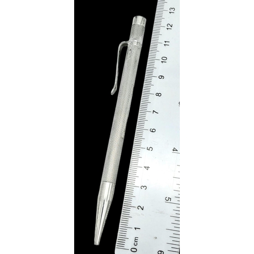 1341 - A Sterling Silver Cased Mechanical Pencil. 12cm. Birmingham hallmarks. 22g total weight.