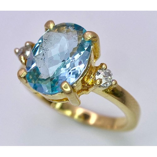 1391 - A STUNNING OVAL FACETED AQUAMARINE AND DIAMOND RING SET IN 18K GOLD .    5.1gms   size M