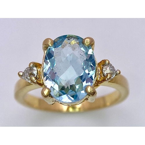 1391 - A STUNNING OVAL FACETED AQUAMARINE AND DIAMOND RING SET IN 18K GOLD .    5.1gms   size M