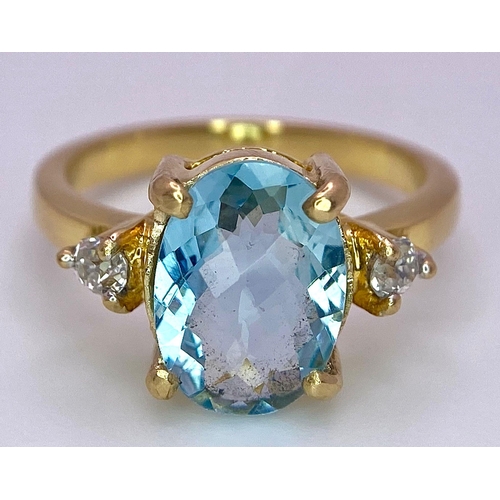 1391 - A STUNNING OVAL FACETED AQUAMARINE AND DIAMOND RING SET IN 18K GOLD .    5.1gms   size M