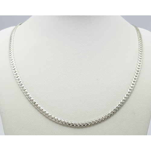 1212 - A 925 silver snake link necklace. Total weight 17.8G. Total length 50cm.