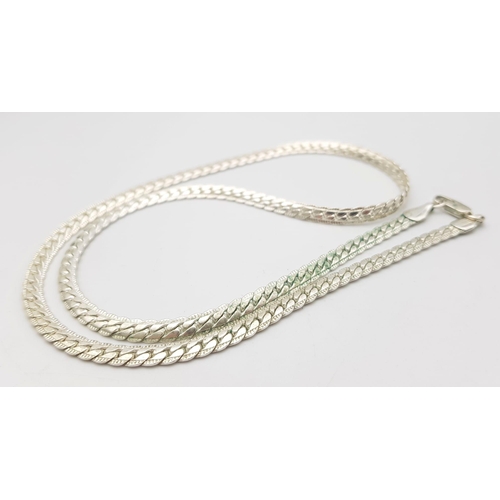 1212 - A 925 silver snake link necklace. Total weight 17.8G. Total length 50cm.