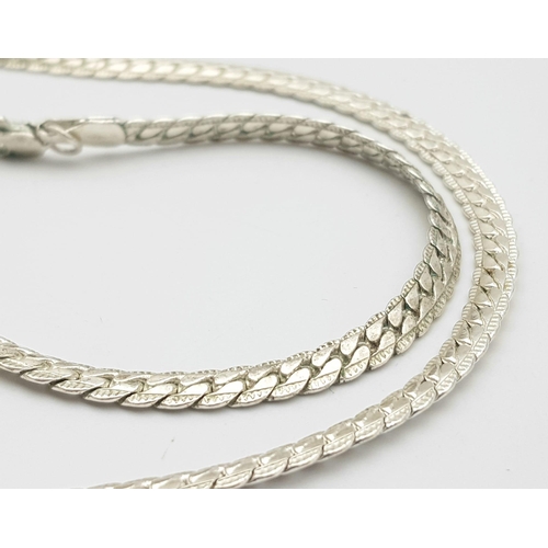 1212 - A 925 silver snake link necklace. Total weight 17.8G. Total length 50cm.