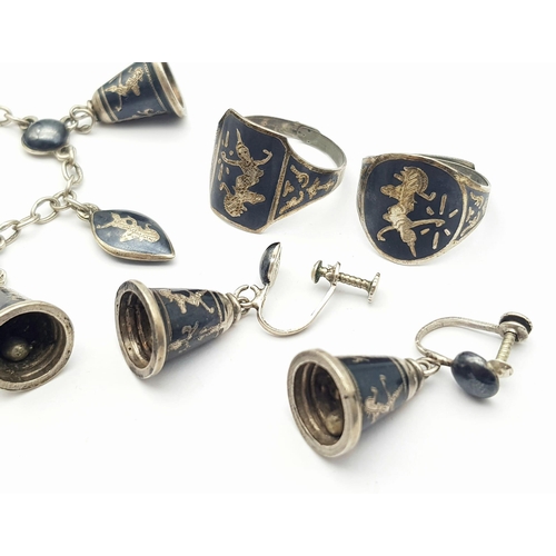 1247 - A matching set of 925 silver Siam jewellery include a pair of bell earrings, 2 adjustable rings and ... 