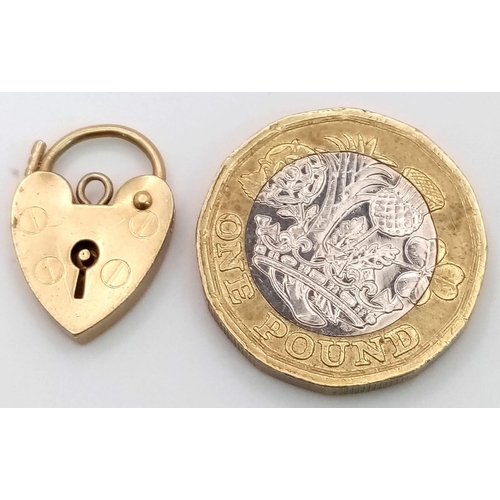 1250 - 9k GOLD HEART PADLOCK .   1.5gms.