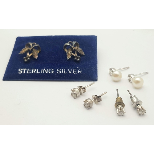 1162 - A collection of 4 stylist pairs of sterling silver earrings. Total weight 5.3G. Please see photos fo... 