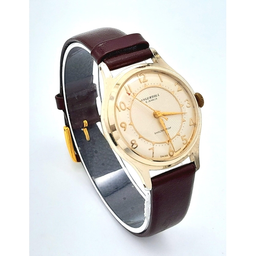 1358 - A Vintage Ingersoll Mechanical Gents Watch. Burgundy leather strap. Gilded case - 32mm. Cream dial. ... 