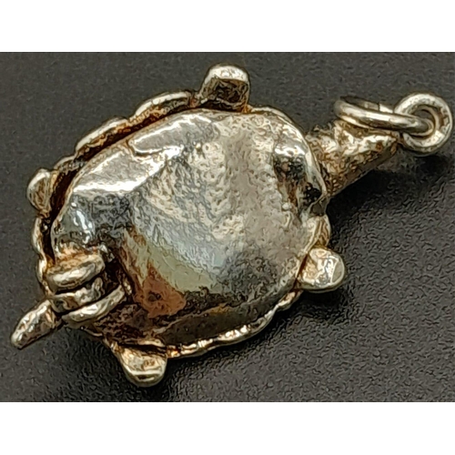 1120 - STERLING SILVER TORTOISE CHARM, WHICH OPENS TO REVEAL A HARE DEPICTING THE FAMOUS TORTOISE AND THE H... 