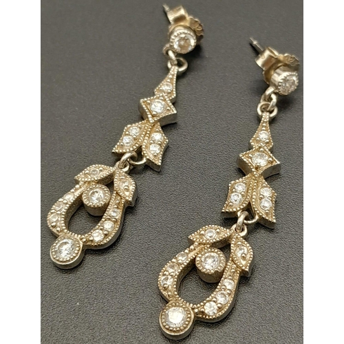 1213 - A Pair of Art Deco Style 925 Silver Drop Earrings. 4cm drop