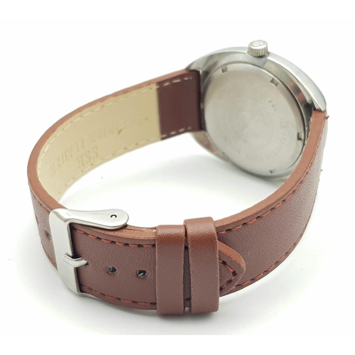 1209 - A Vintage Tressa Automatic Gents Watch. Brown leather strap. Stainless steel case - 36mm. Metallic g... 