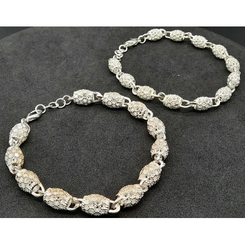 1233 - 2X fancy  925 silver hollow link bracelets  . Total weight 28.28G. Total length 21cm.