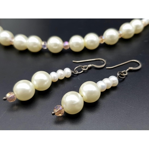 1351 - A Vintage Classic Rosita Faux Pearl Jewellery Set. Two necklace and a pair of drop earrings in the o... 