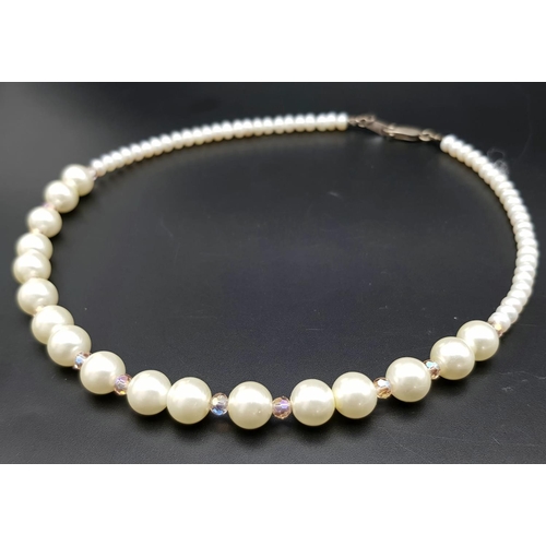 1351 - A Vintage Classic Rosita Faux Pearl Jewellery Set. Two necklace and a pair of drop earrings in the o... 