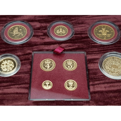 25 - A Breathtaking Limited Edition 2002 Golden Jubilee 22K Gold Proof Coin Set. This set contains a comp... 