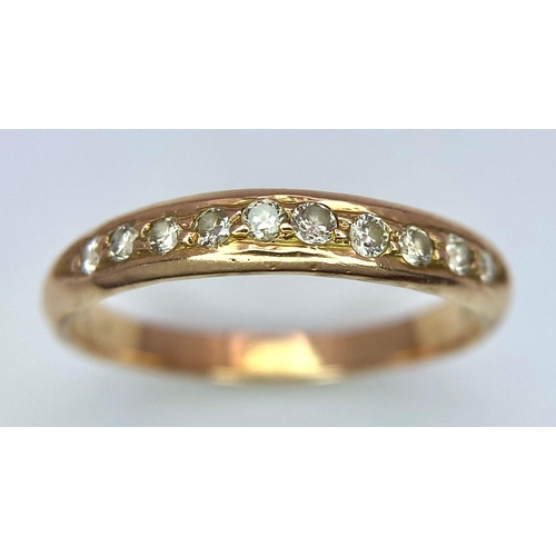 30 - A 14k Yellow Gold Diamond Half Eternity Ring. Size N. 2.1g total weight.