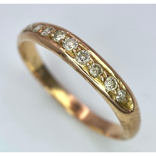 30 - A 14k Yellow Gold Diamond Half Eternity Ring. Size N. 2.1g total weight.