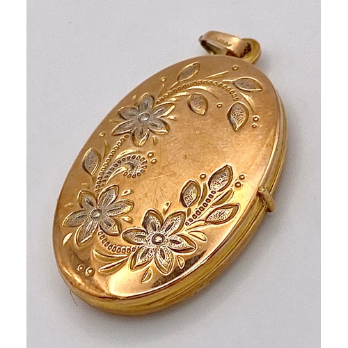 4 - A Vintage 9K Yellow and White Gold Locket Pendant. 4.5cm. 5.1g total weight.