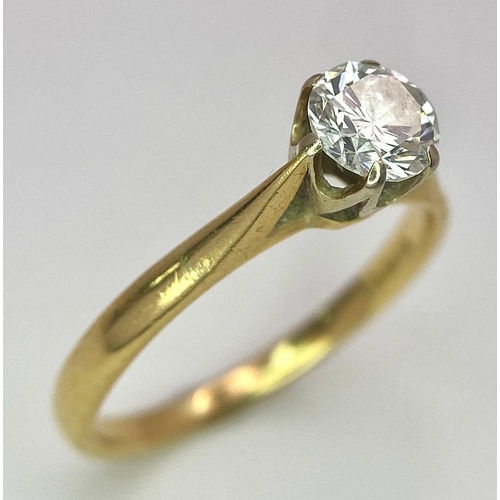 44 - An 18K Yellow Gold Diamond Solitaire Ring. 0.75ct brilliant round cut diamond. Size N. 2.65g total w... 