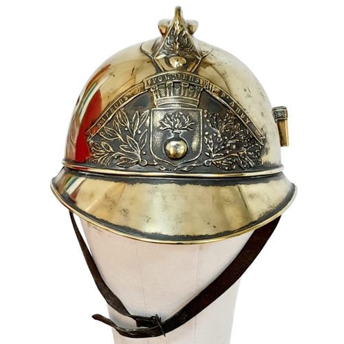 49 - A Late 19th Century French Fireman's Brass Ornate Helmet. 
With original liner.