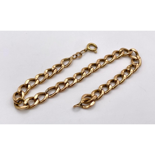 51 - An 18K Yellow Gold Flat Curb Link Bracelet. 19cm. 4.25g weight.