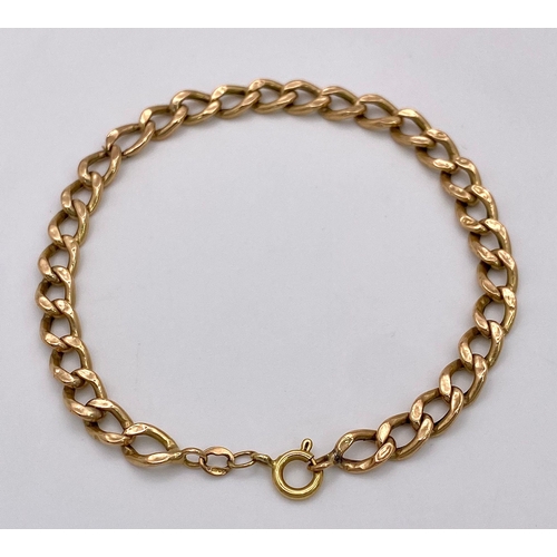 51 - An 18K Yellow Gold Flat Curb Link Bracelet. 19cm. 4.25g weight.