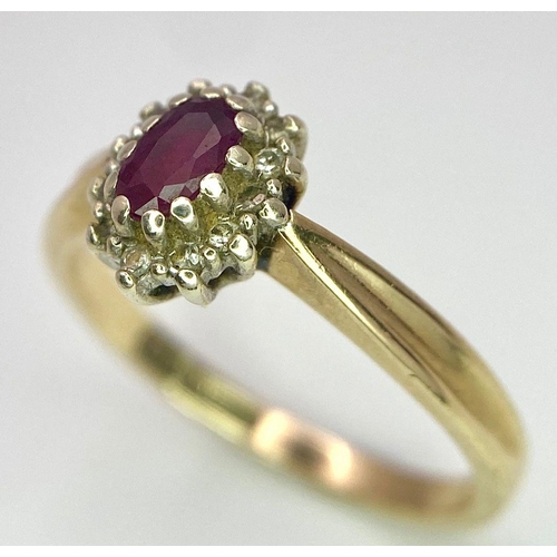 94 - A Vintage 9K Yellow Gold Diamond and Ruby Ring. Central oval diamond with diamond surround. Size L. ... 