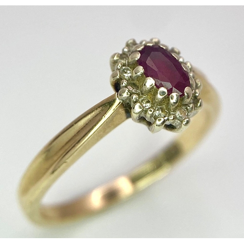 94 - A Vintage 9K Yellow Gold Diamond and Ruby Ring. Central oval diamond with diamond surround. Size L. ... 