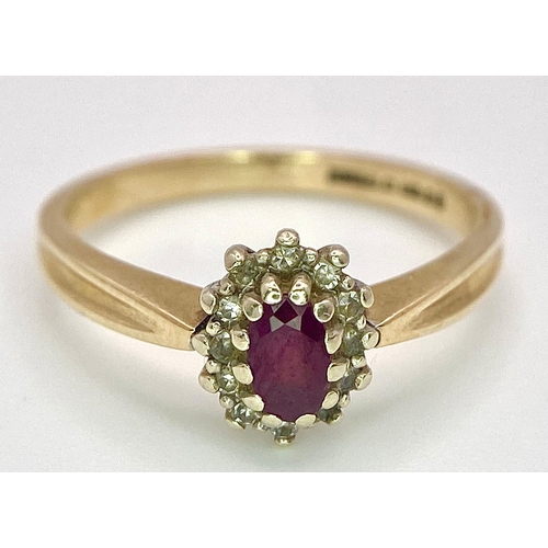 94 - A Vintage 9K Yellow Gold Diamond and Ruby Ring. Central oval diamond with diamond surround. Size L. ... 