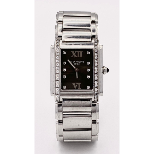 101 - A Stunning Patek Philippe Diamond Twenty - 4 Ladies Watch. Stainless steel bracelet and case - 25 x ... 