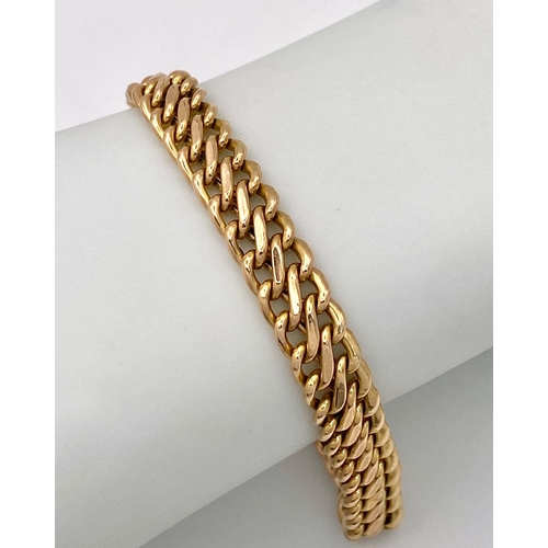 73 - A 9K Yellow Gold Double Curb Link Bracelet. 18cm. 7.74g weight.