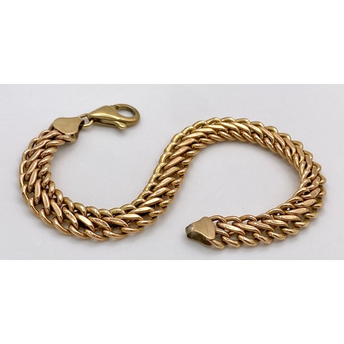 73 - A 9K Yellow Gold Double Curb Link Bracelet. 18cm. 7.74g weight.