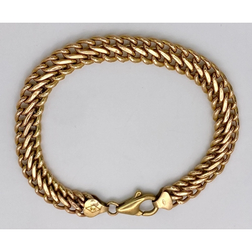 73 - A 9K Yellow Gold Double Curb Link Bracelet. 18cm. 7.74g weight.