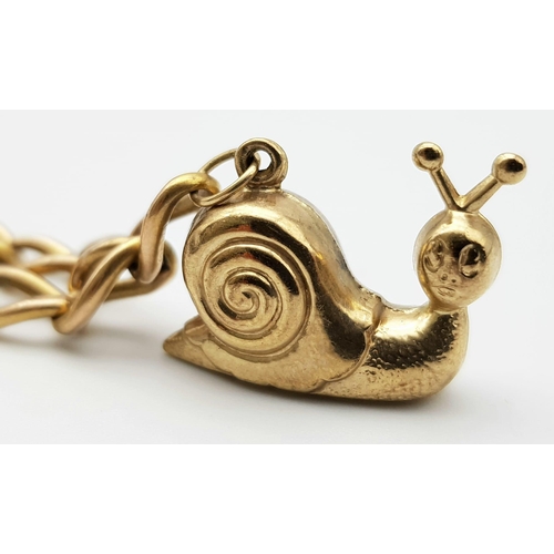 108 - A vintage 9 K rose gold chain bracelet with a padlock clasp and two chams (a snail and a duck). Good... 