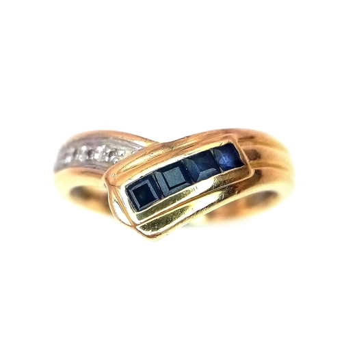 113 - A Stylish 18K Yellow Gold Diamond and Sapphire Crossover Ring. Size L. 3.6g total weight.