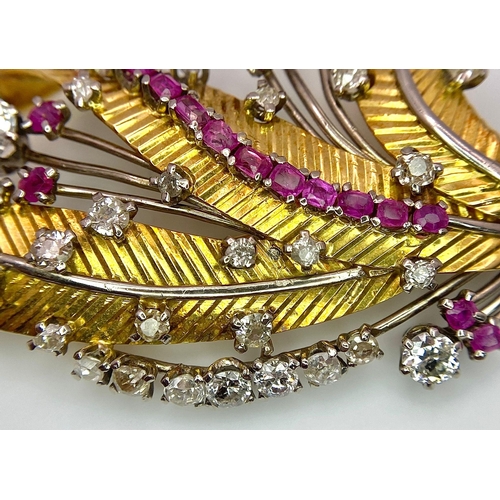 38 - A Spectacular 18K Gold (tested) Diamond and Ruby Leaf Brooch. 3ctw of brilliant round cut diamonds a... 