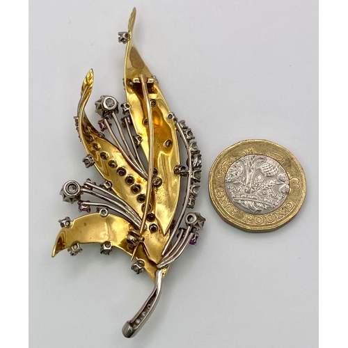 38 - A Spectacular 18K Gold (tested) Diamond and Ruby Leaf Brooch. 3ctw of brilliant round cut diamonds a... 