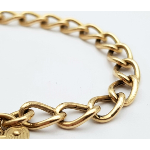 66 - A Vintage 9K Yellow Gold Curb Link Bracelet with Heart Clasp. 18cm. 8.4g weight.