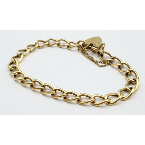66 - A Vintage 9K Yellow Gold Curb Link Bracelet with Heart Clasp. 18cm. 8.4g weight.