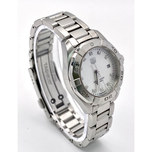 78 - A Tag Heuer Aqua Racer Quartz Ladies Watch. Stainless steel bracelet and case - 28mm. Mother of pear... 