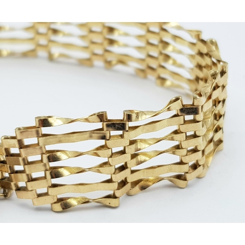 9 - A Vintage 9K Yellow Gold Gate Bracelet with Heart Clasp. 16cm. 6.82g weight.