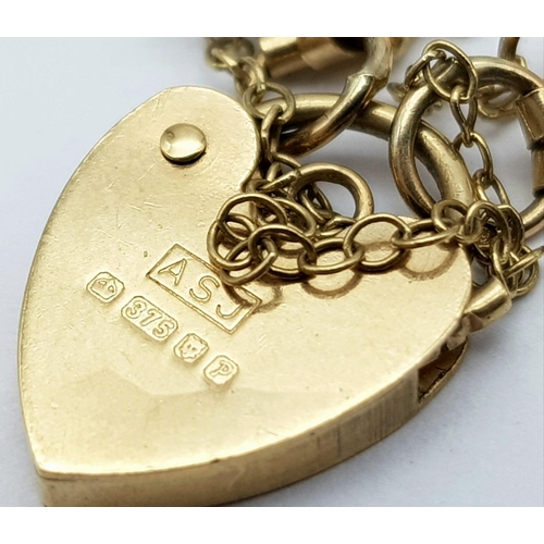 9 - A Vintage 9K Yellow Gold Gate Bracelet with Heart Clasp. 16cm. 6.82g weight.