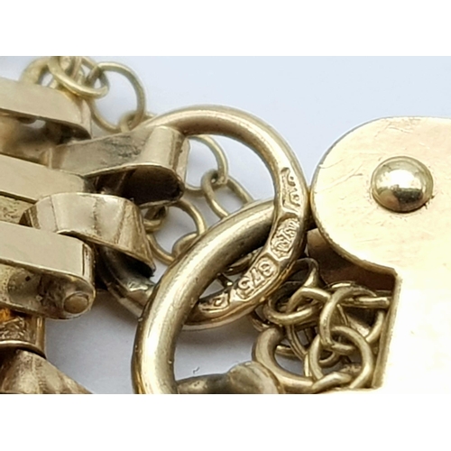 9 - A Vintage 9K Yellow Gold Gate Bracelet with Heart Clasp. 16cm. 6.82g weight.