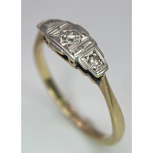 122 - An ART DECO 9 K yellow gold and platinum ring with a trilogy of round cut diamonds. Size: L, weight:... 